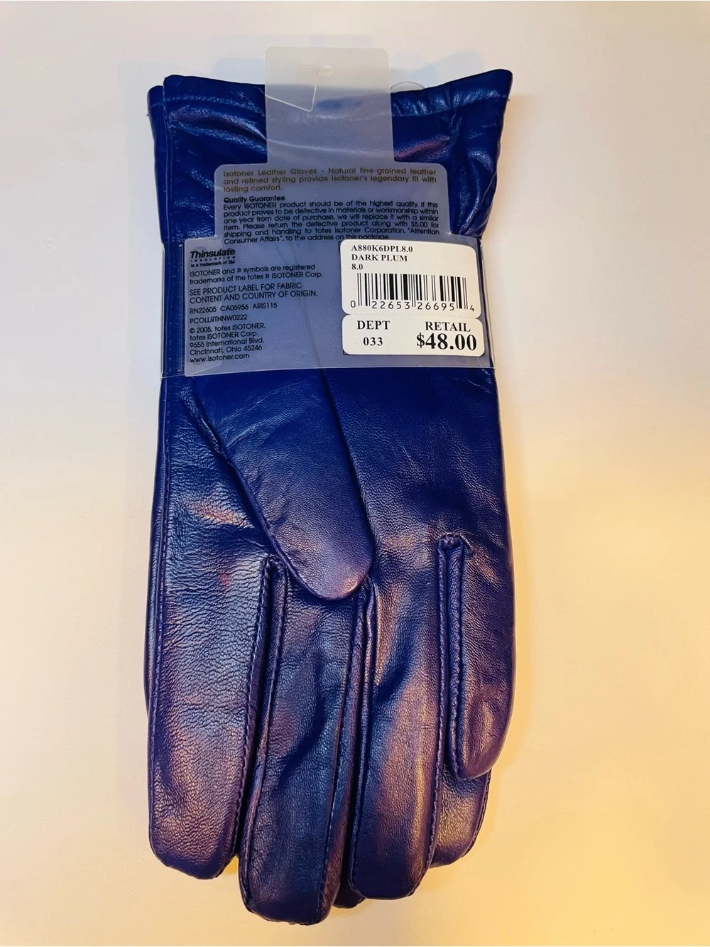 Beautiful Isotoner Thinsulate purple leather gloves. New in packaging